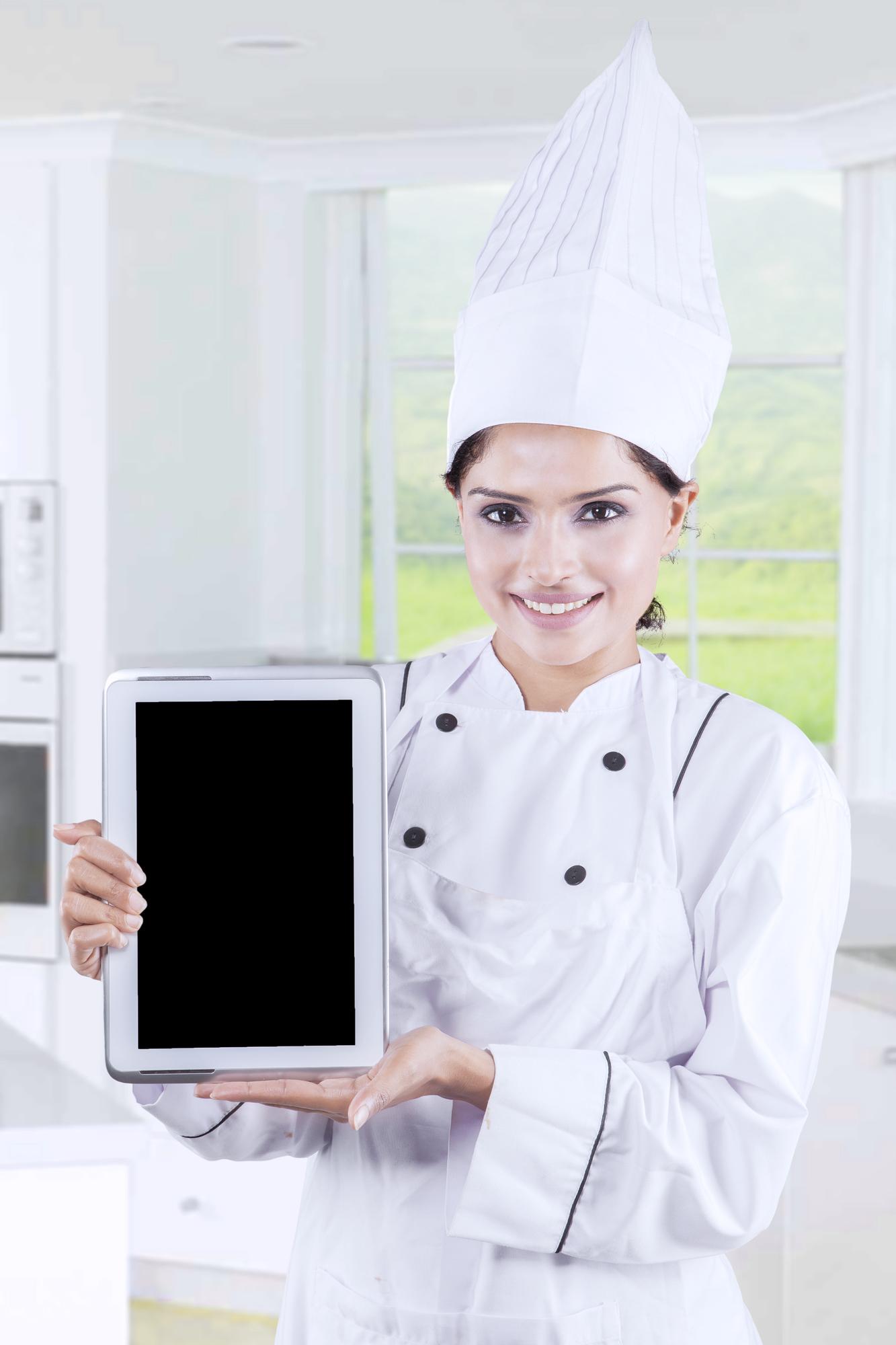 Chef teaching using futuristic kitchen tools